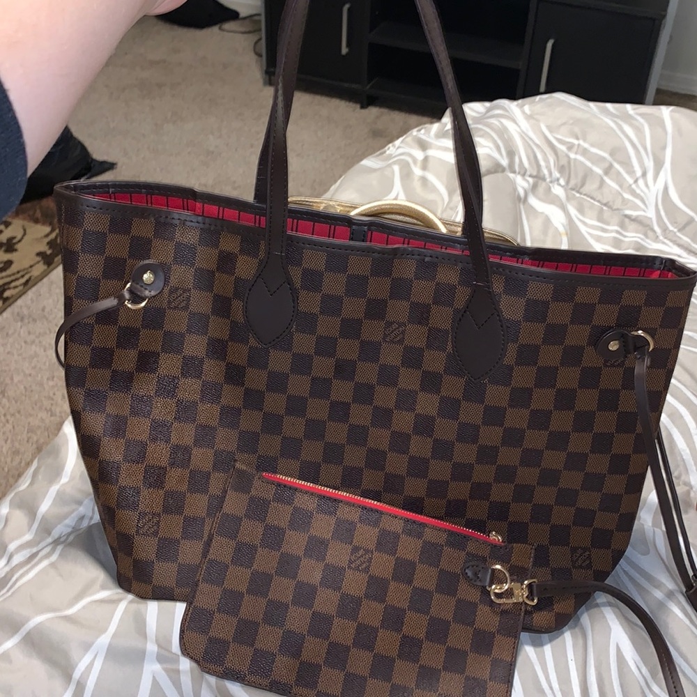 large brown tote and wristlet